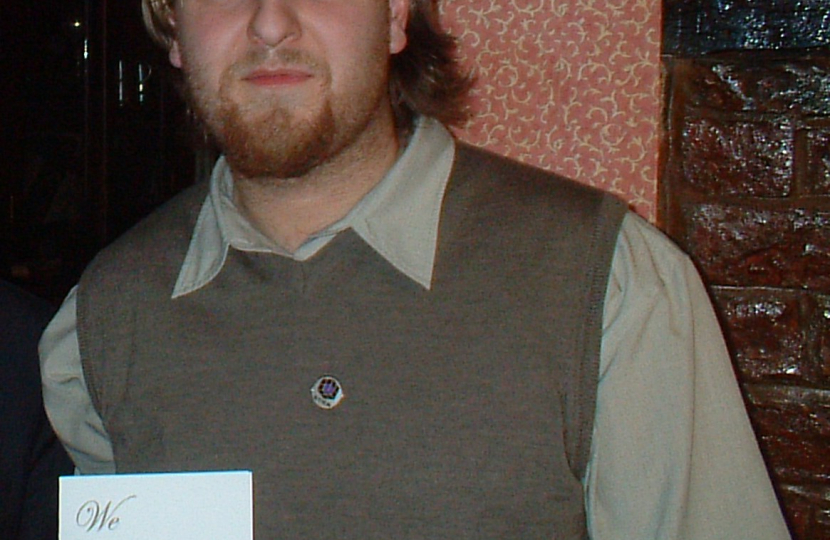 Robert holding a we love Erdington card!