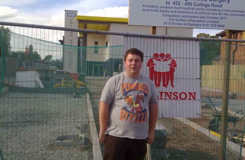 Gary outside of the new doctors surgery on College Road