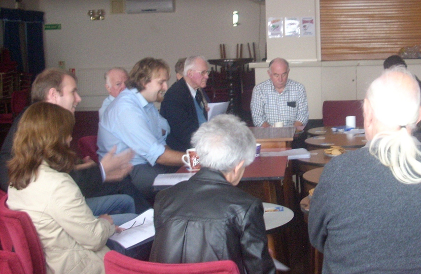 Gareth, Robert and Bob listening to local residents