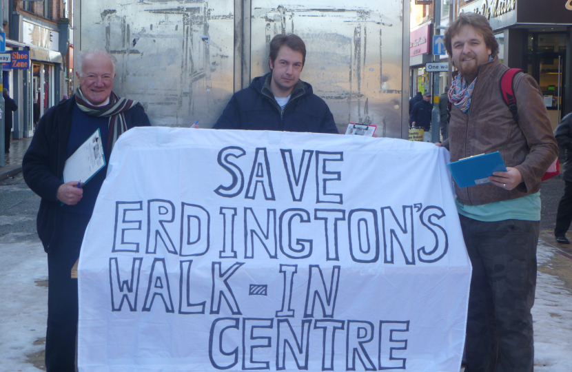 Bob, Gareth and Robert with their banner to save the centre