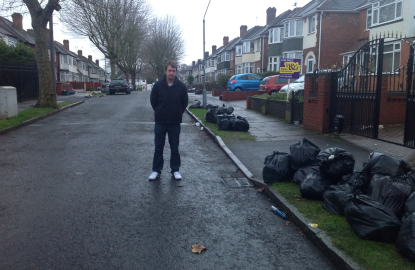 Gareth by the dumped rubbish on Dunvegan Road