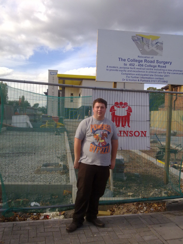 Gary outside of the new doctors surgery on College Road