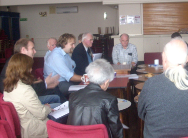 Gareth, Robert and Bob listening to local residents