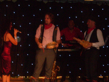 Cllr Robert Alden on stage joining in the show