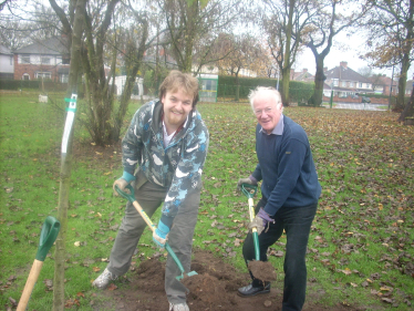 Robert and Bob planting a tree in Short Heath Park